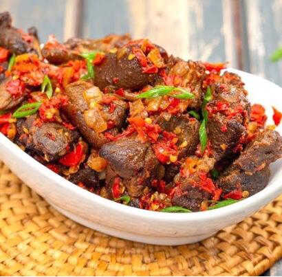 Asun (Spicy Smoked Goat)
